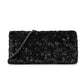 Chanel black sequin East West Flap Bag from 2014–15 with silver-tone CC hardware and leather-interwoven chain shoulder strap.