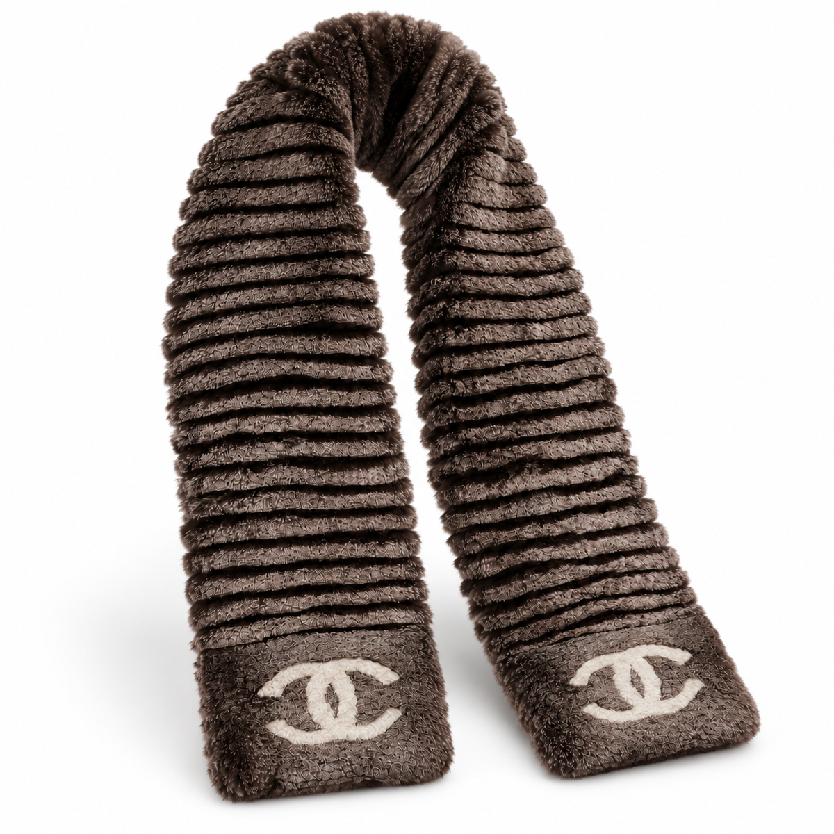 Chanel Orylag and fabric CC scarf featuring luxurious textures and classic design, displayed on a neutral background.