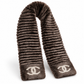 Chanel Orylag and fabric CC scarf featuring luxurious textures and classic design, displayed on a neutral background.