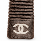 Chanel Orylag and fabric CC scarf featuring luxurious textures in a stylish design.