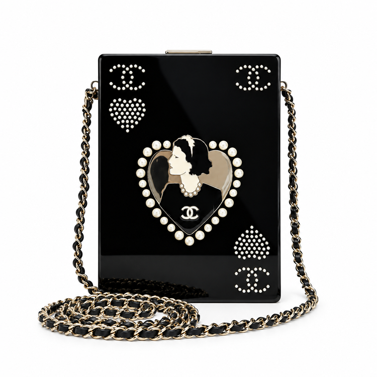 Chanel Pearl Playing Card Casino Minaudière Clutch in glossy black with pearl CC and heart motifs, portrait medallion, gold-tone hardware and chain strap.
