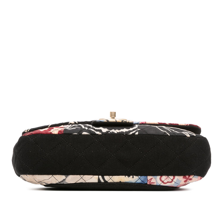 Chanel multicolour quilted patchwork Medium Flap Bag with printed textile panels, gold-tone chain strap, CC turn-lock closure and decorative medallion charm.