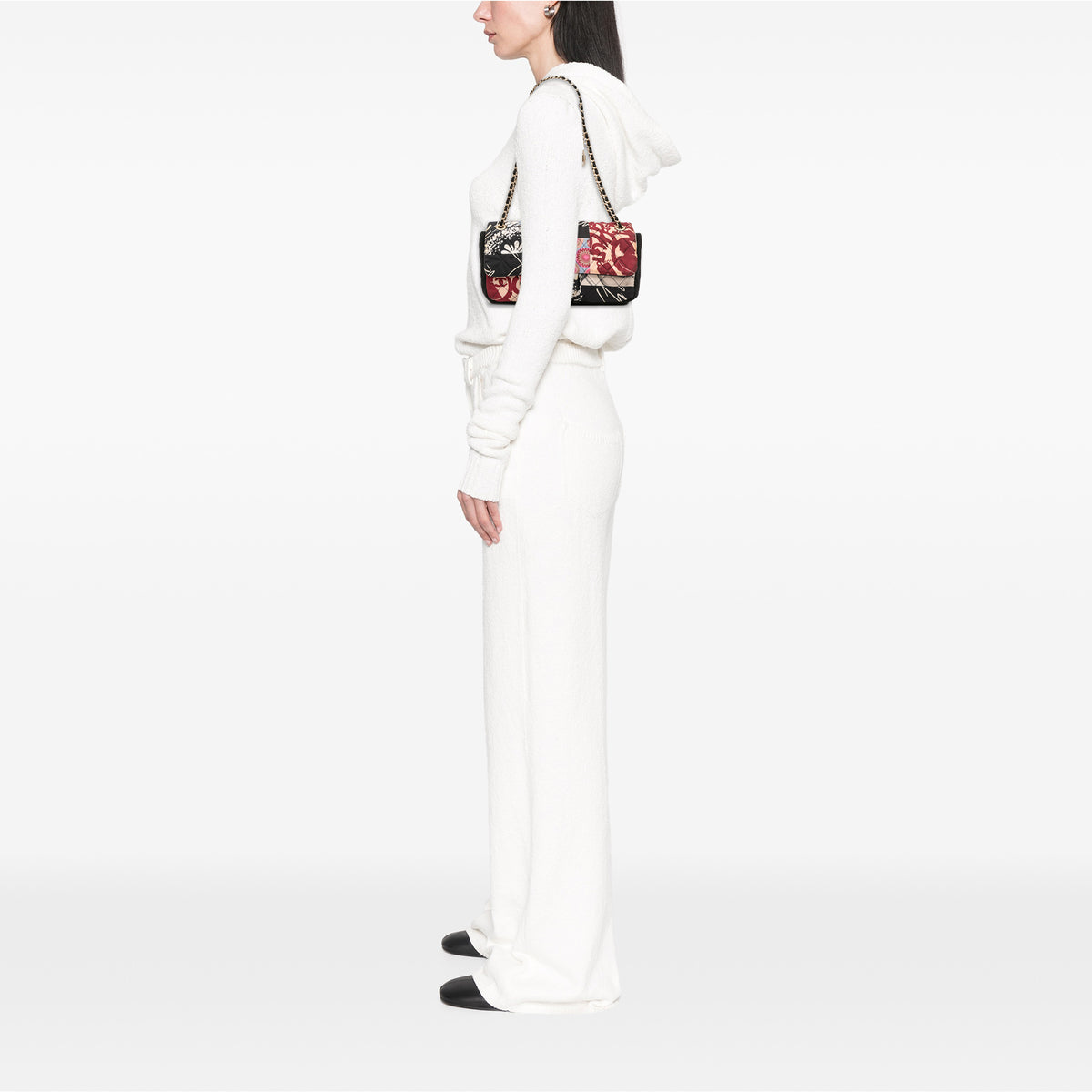 Chanel multicolour quilted patchwork Medium Flap Bag with printed textile panels, gold-tone chain strap, CC turn-lock closure and decorative medallion charm.