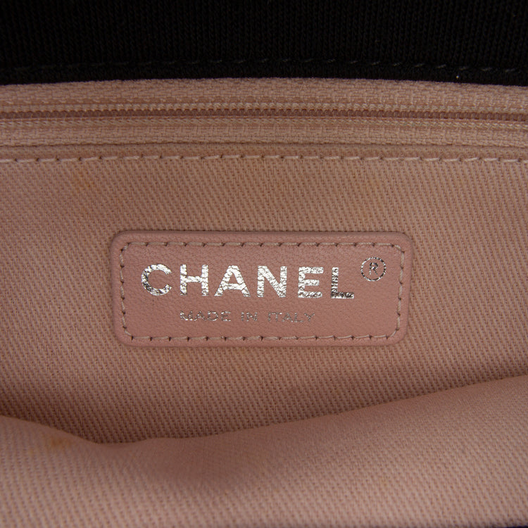 Chanel multicolour quilted patchwork Medium Flap Bag with printed textile panels, gold-tone chain strap, CC turn-lock closure and decorative medallion charm.