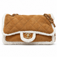 Chanel jumbo suede shearling quilted Coco Neige flap shoulder bag with quilted design and silver-tone hardware.