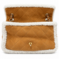 Chanel Jumbo suede shearling quilted Coco Neige flap shoulder bag with gold-tone hardware and quilted design.