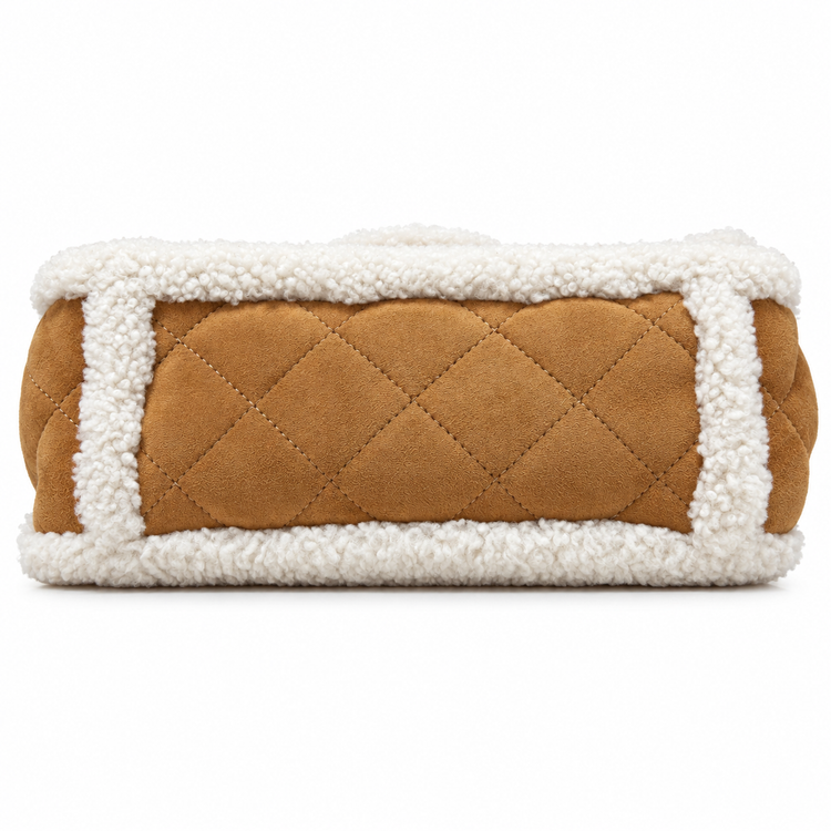 Chanel jumbo suede shearling quilted Coco Neige flap shoulder bag with quilted design and signature Chanel hardware.
