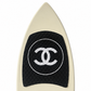 2019 Chanel white and black CC logo wakesurf board with pointed shape, black quilted traction pads, oversized interlocking CC logo, circular Chanel emblem, and collectible luxury board design.