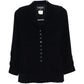 Chanel 1996 navy wool blazer with silver CC buttons, tailored fit, classic collar, and long sleeves.