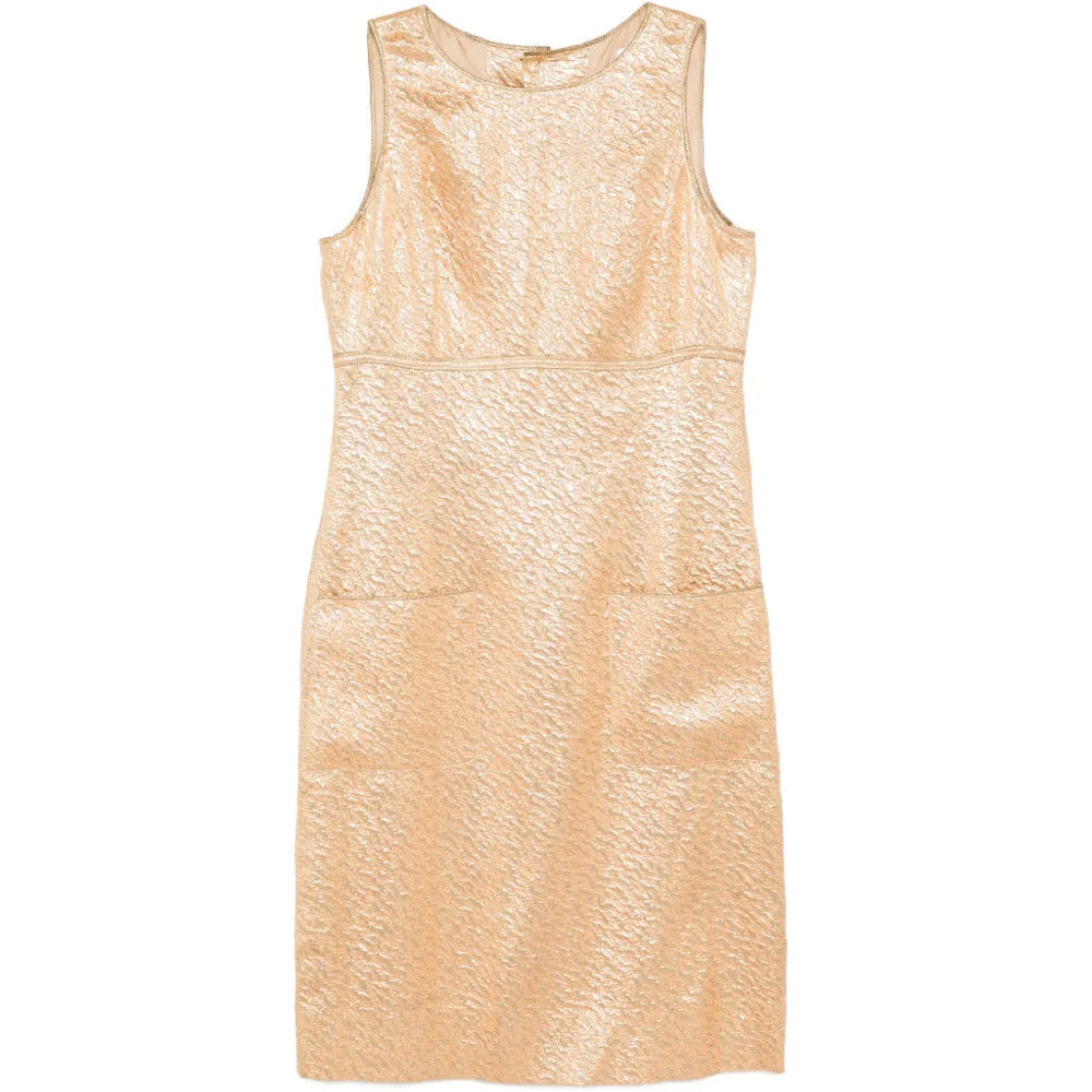 Chanel 1996 sleeveless gold brocade shift dress showing intricate fabric pattern and elegant silhouette.