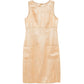 Chanel 1996 sleeveless gold brocade shift dress showing intricate fabric pattern and elegant silhouette.