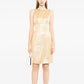 Chanel 1996 sleeveless gold brocade shift dress featuring intricate patterns and a classic silhouette.