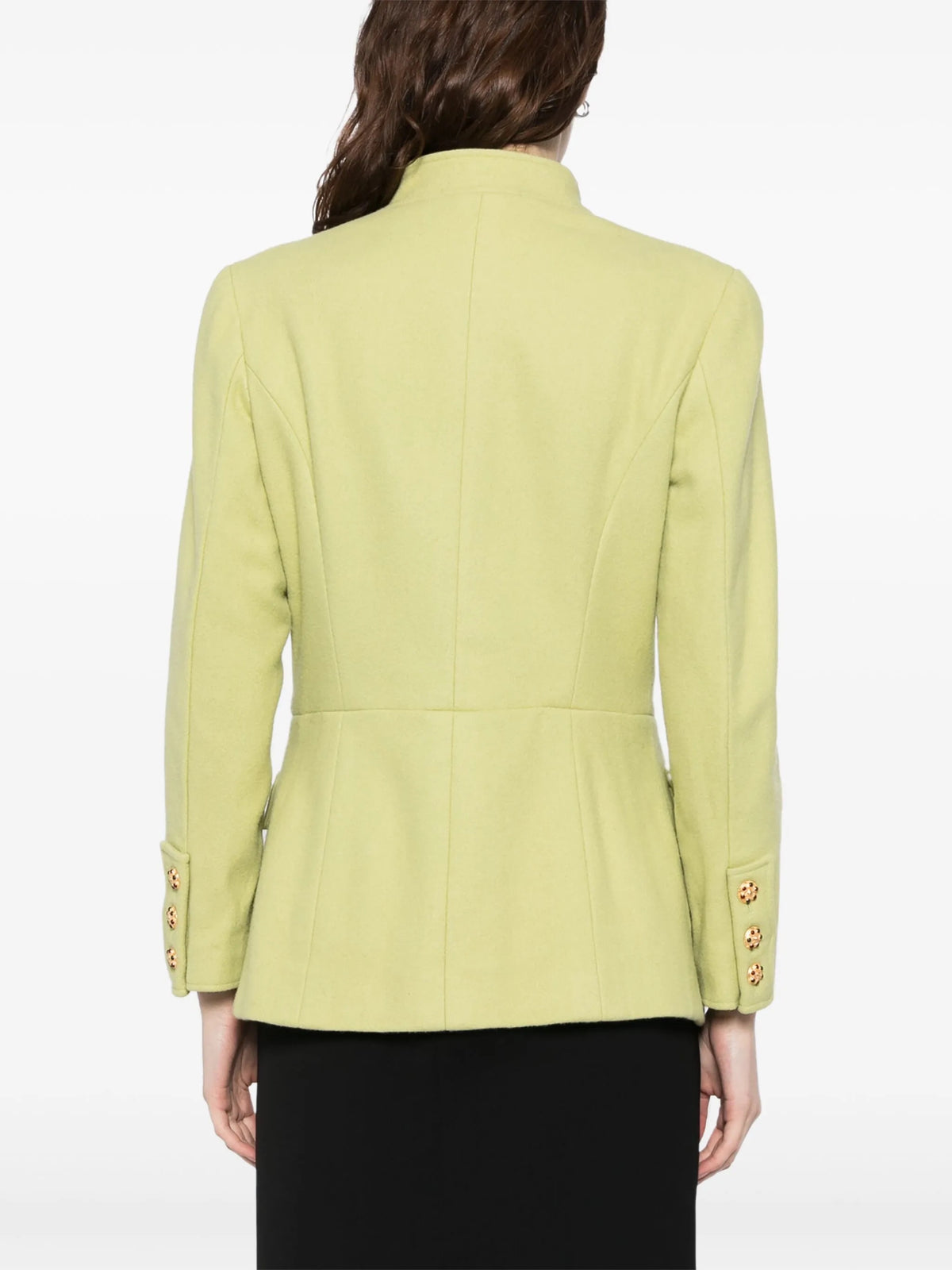 Light green vintage Chanel blazer from 1996, fitted style with classic design, displayed on a hanger.