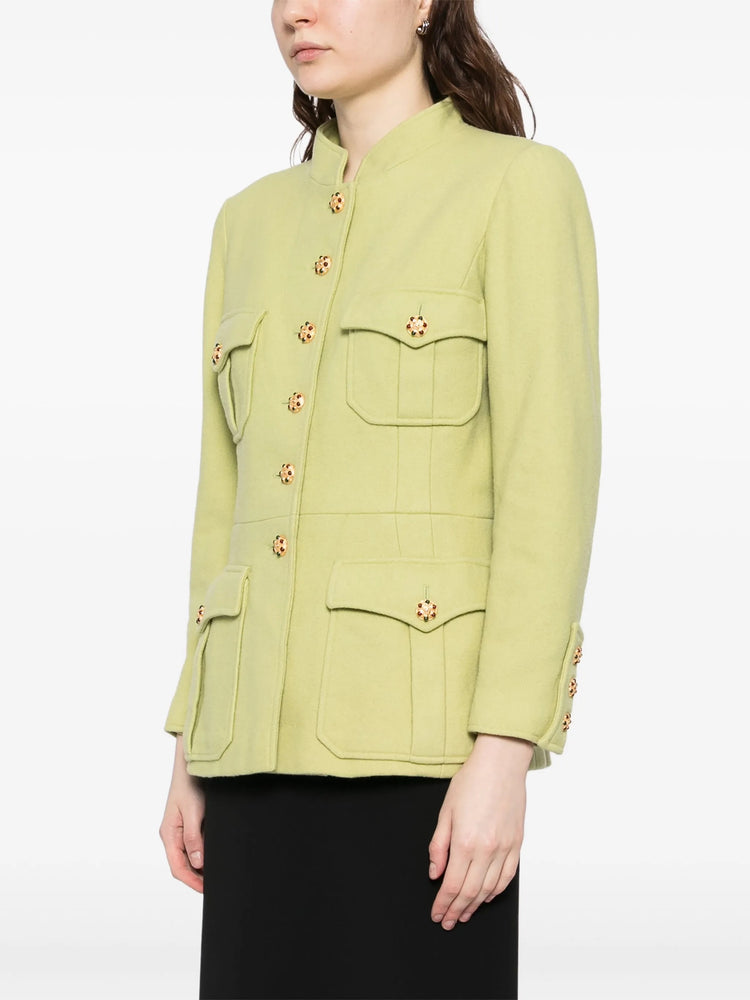 Light green Chanel vintage 1996 fitted blazer jacket with tailored design and classic style, suitable for elegant casual wear.