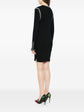 Black Chanel 2002 cotton mini dress with ribbed fabric, sleeveless design, and fitted silhouette.