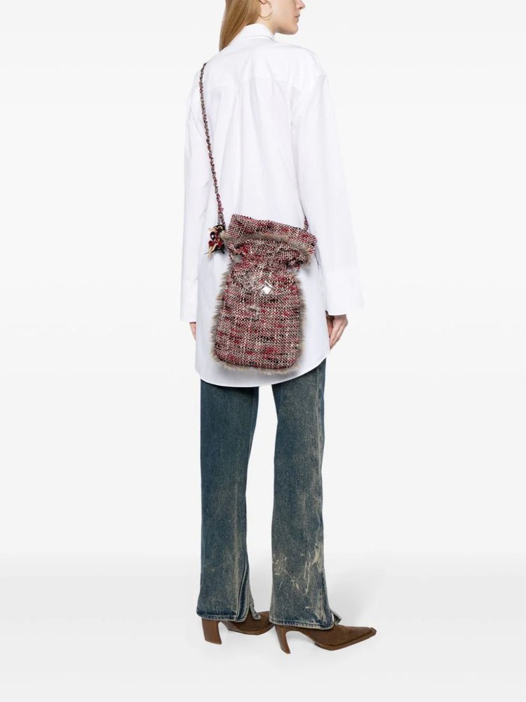 Chanel red tweed bag, close-up of CC logo hardware