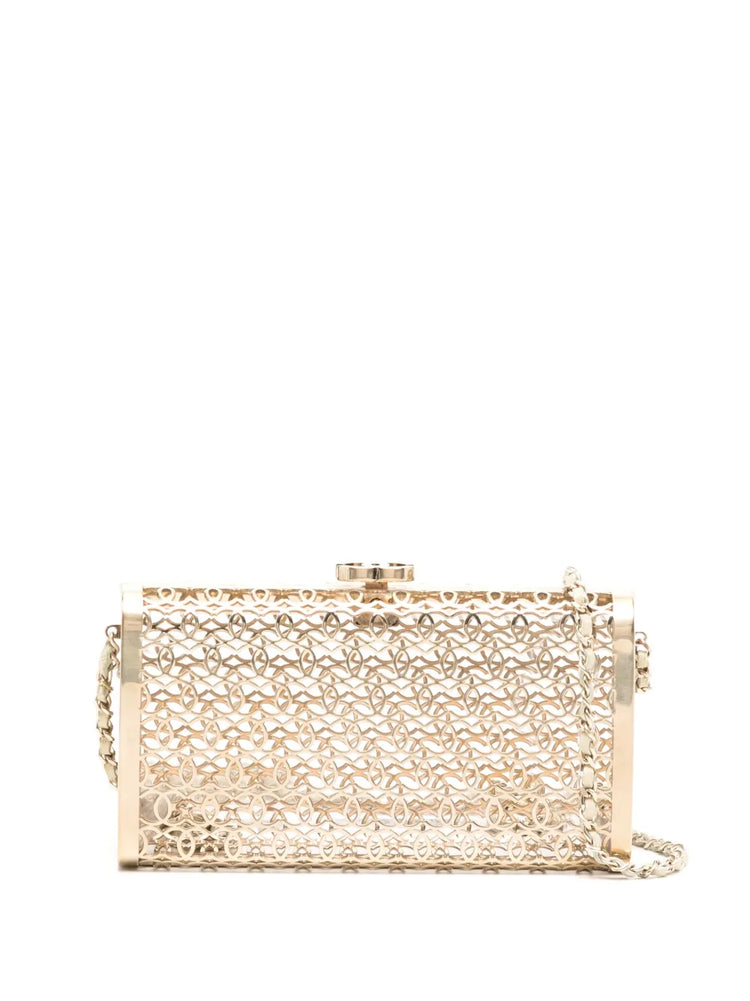 Chanel 2015 CC Moucharabieh minaudiere clutch with intricate geometric design and elegant gold-tone hardware.