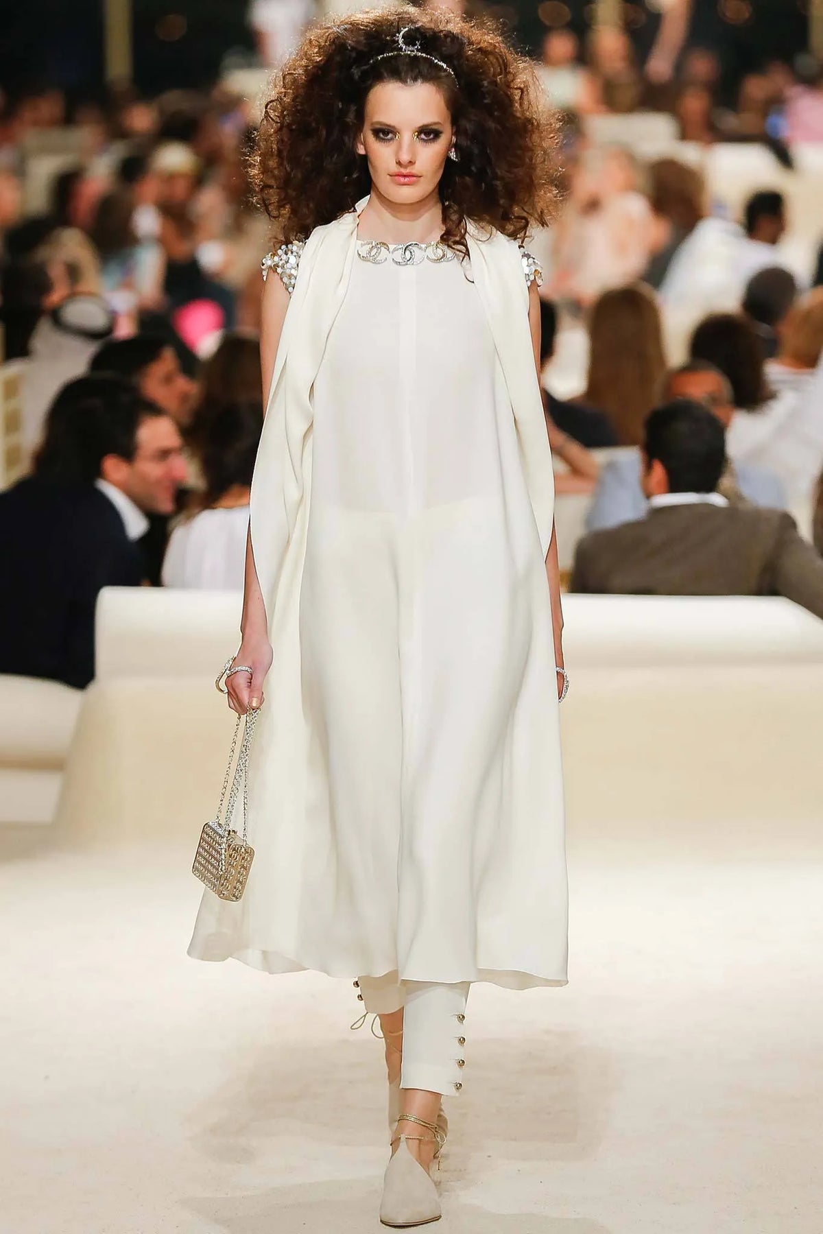 Chanel 2015 CC Moucharabieh minaudière clutch with intricate geometric design, compact evening bag for formal occasions.
