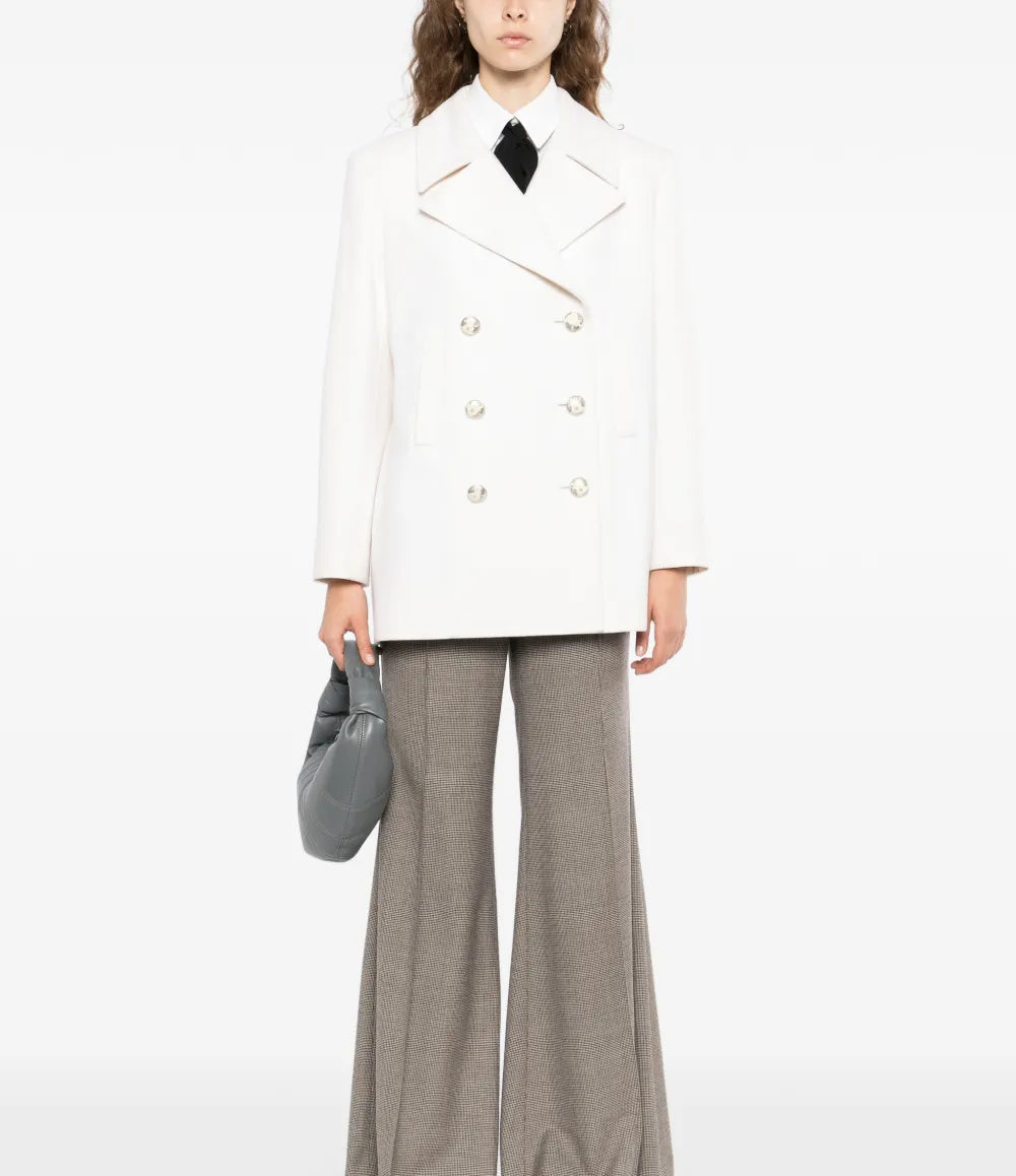 Chanel 2017 ecru wool and cashmere peacoat, stylish blazer with classic double-breasted design and textured fabric.