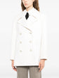 Chanel 2017 ecru wool and cashmere peacoat with double-breasted design, classic collar, and textured fabric for a sophisticated look.