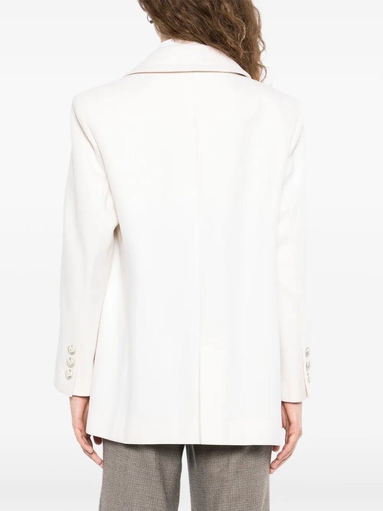 Chanel 2017 ecru wool and cashmere peacoat with double-breasted design and classic lapels on a hanger.