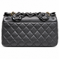 Chanel 2014–2015 black lambskin and patent leather 3D Camellia Flower Medium Flap Bag with gold-tone CC hardware and chain strap.
