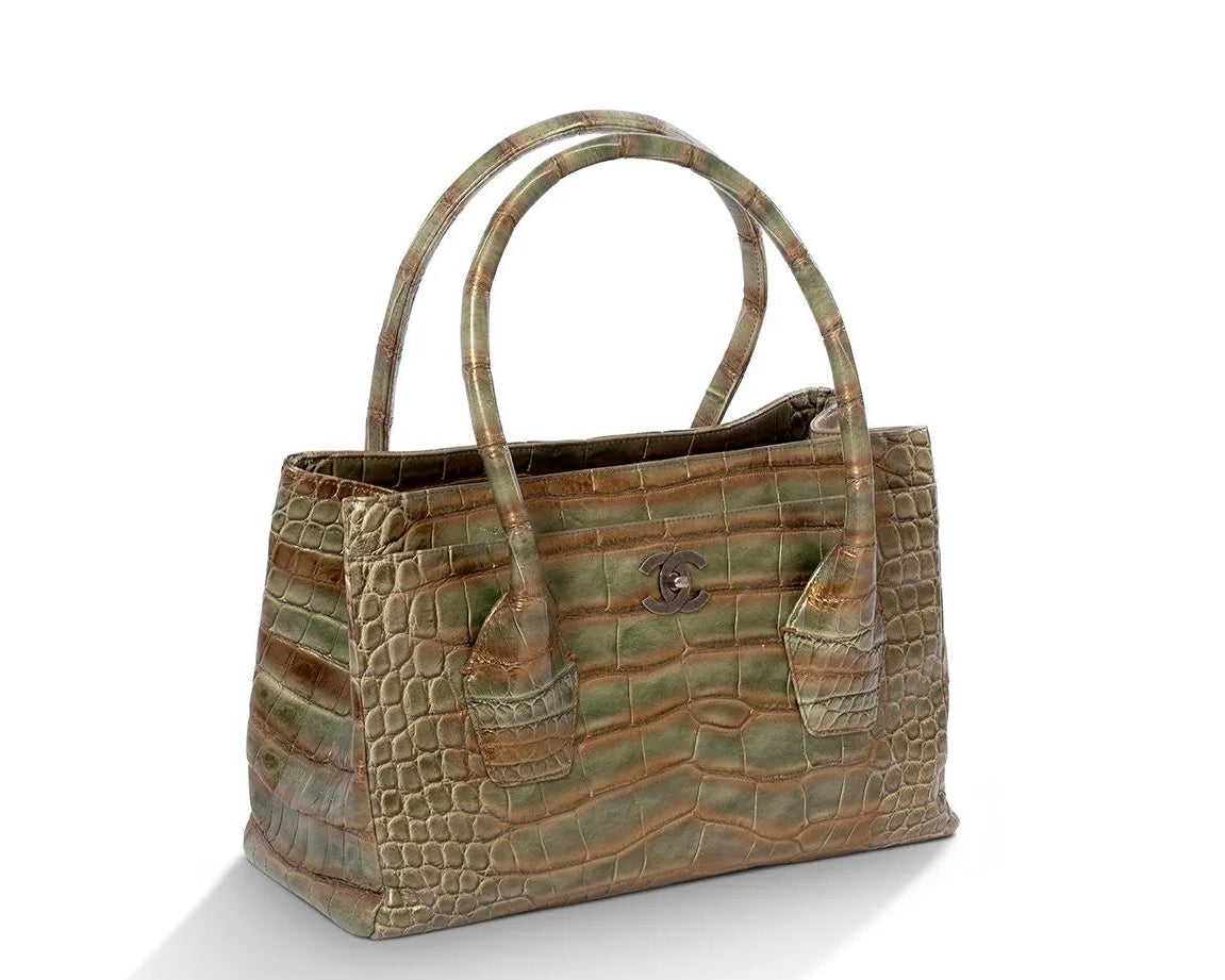Chanel green alligator Cerf Tote from the 2006–2008 Karl Lagerfeld collection with antiqued silver-tone CC hardware, rolled handles and structured silhouette.