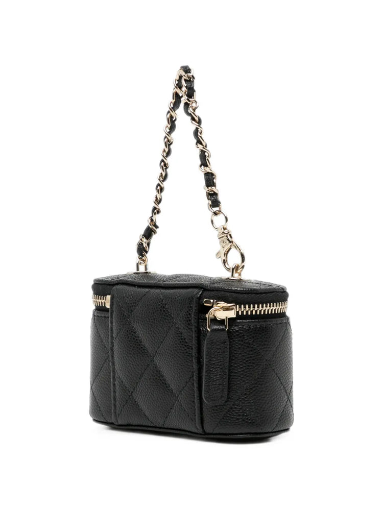 Chanel quilted caviar mini vanity bag charm with gold-tone hardware and chain, designed as a stylish small accessory for bags.