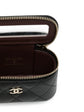 Chanel quilted caviar mini vanity bag charm with gold-tone hardware, small accessories for handbag decoration.