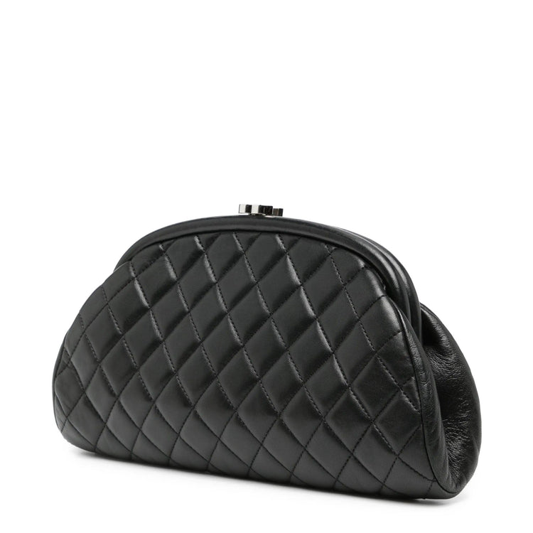 Chanel black clutch, side view of quilted leather
