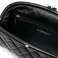 Chanel black quilted clutch, interior view