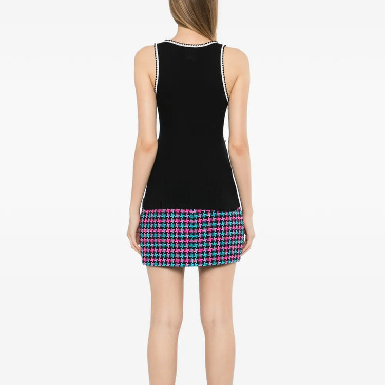 Black ribbed knit contrast tank top by Chanel, featuring a fitted sleeveless design and stylish ribbed texture.