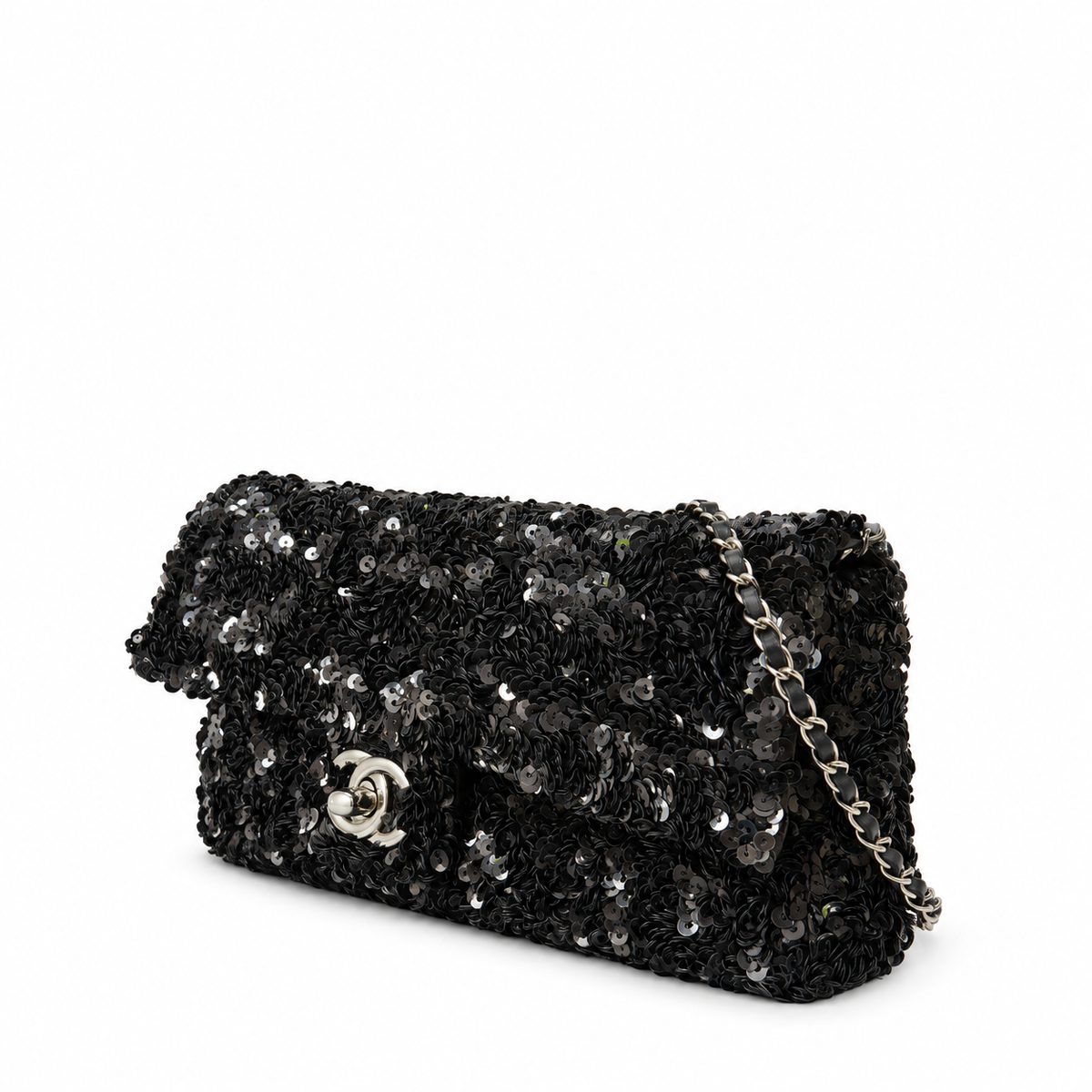 Black Chanel sequin east-west flap shoulder bag with silver chain strap and elegant design.