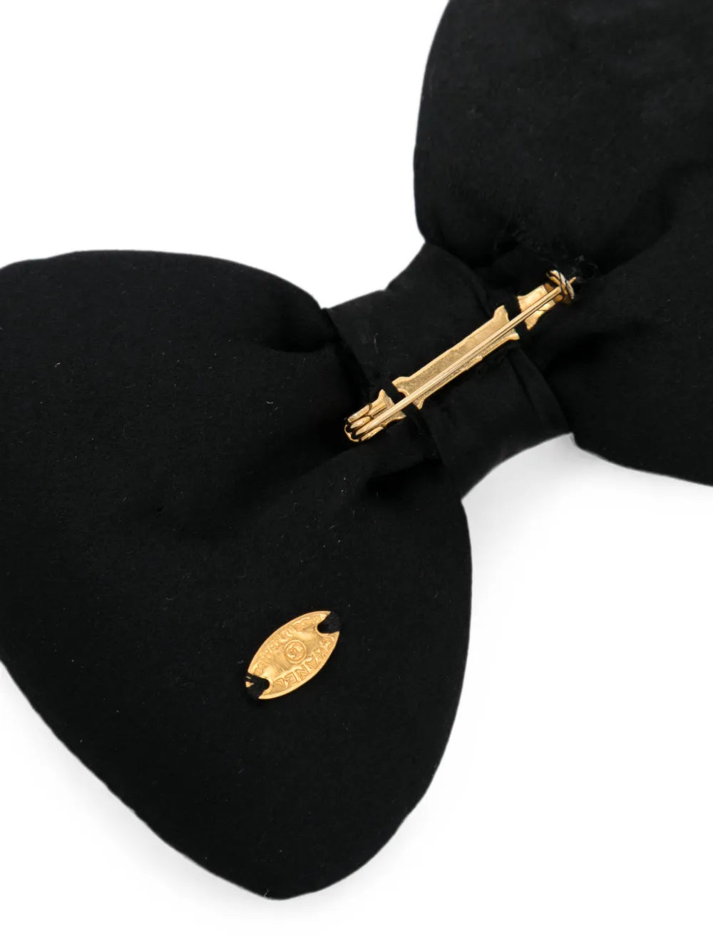 Chanel satin bow brooch featuring a elegant bow design with a smooth satin finish, perfect for accessorizing and adding sophistication.