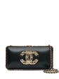 Chanel CC Chain Around Clutch in black leather with gold-tone chain trim, front CC motif, top clasp closure and chain-and-leather shoulder strap.