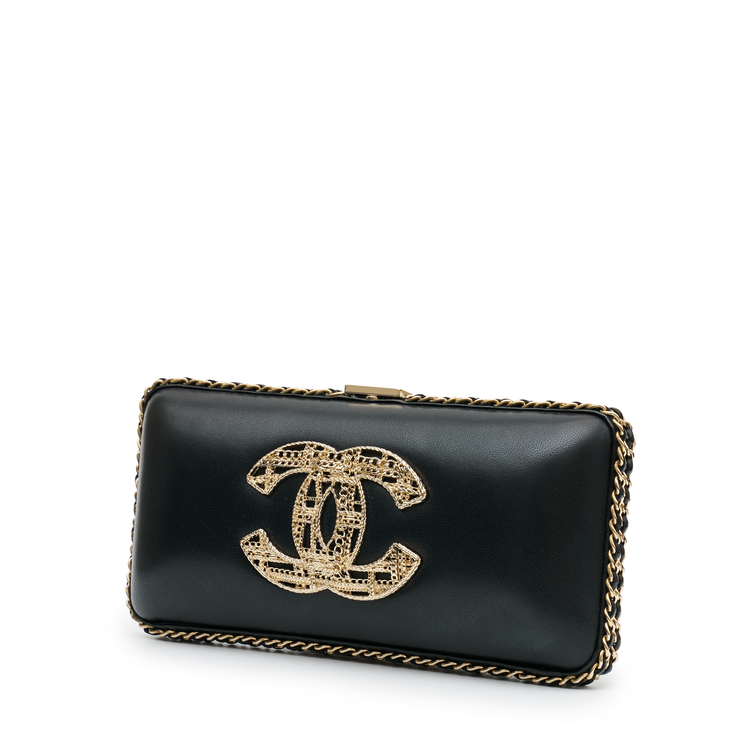 Chanel CC Chain Around Clutch in black leather with gold-tone chain trim, front CC motif, top clasp closure and chain-and-leather shoulder strap.