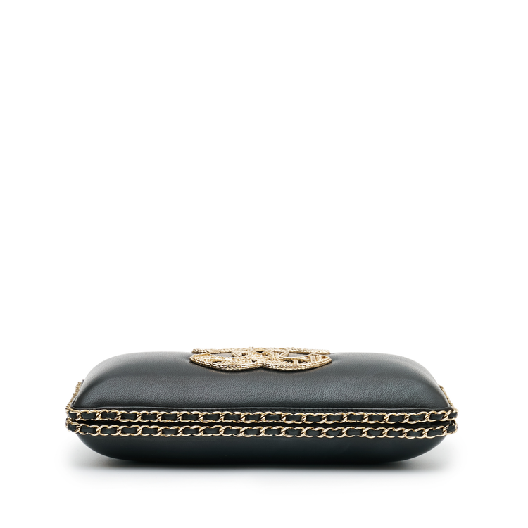 Chanel CC Chain Around Clutch in black leather with gold-tone chain trim, front CC motif, top clasp closure and chain-and-leather shoulder strap.