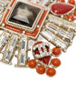 Chanel Crystals and Red Stones CC Brooch featuring sparkling crystals and vibrant red stones on a elegant brooch design.