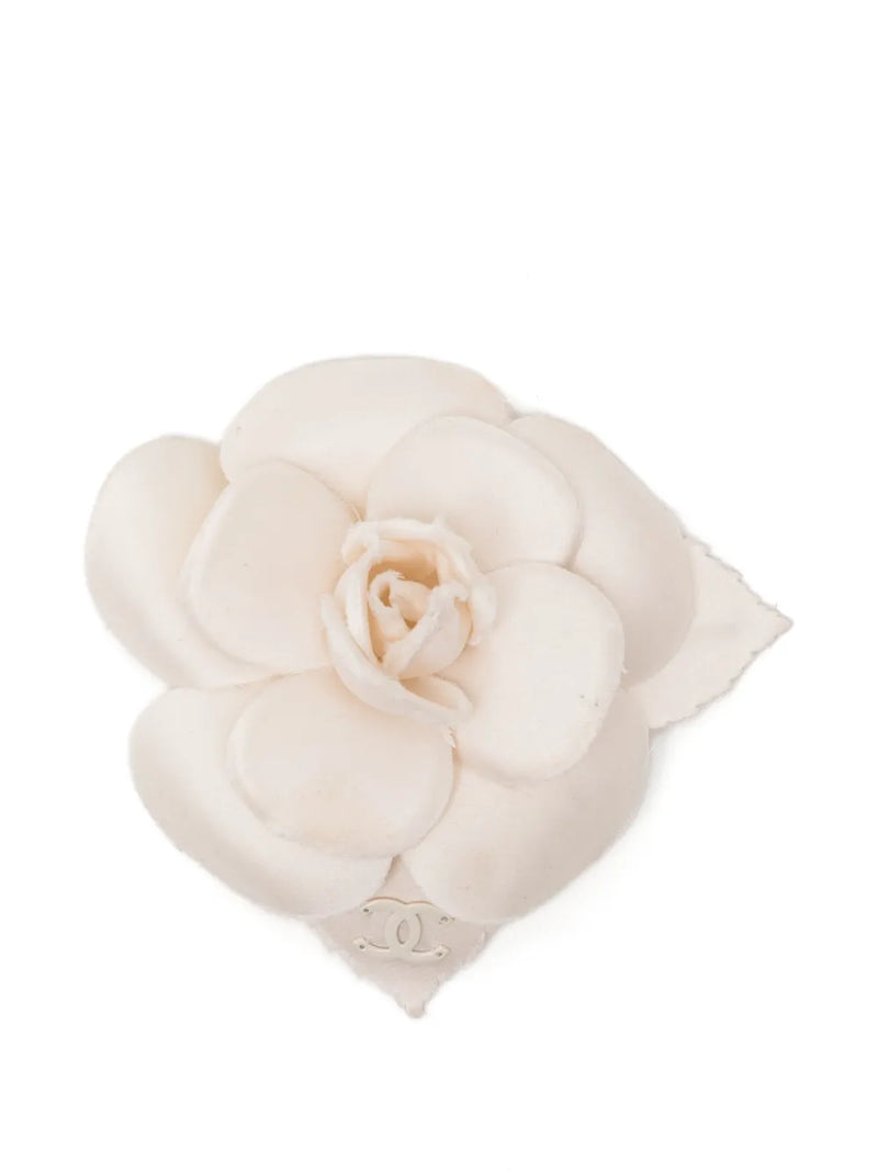 Chanel 2019 Camélia CC brooch with intricate flower design and signature logo, elegant jewelry accessory.