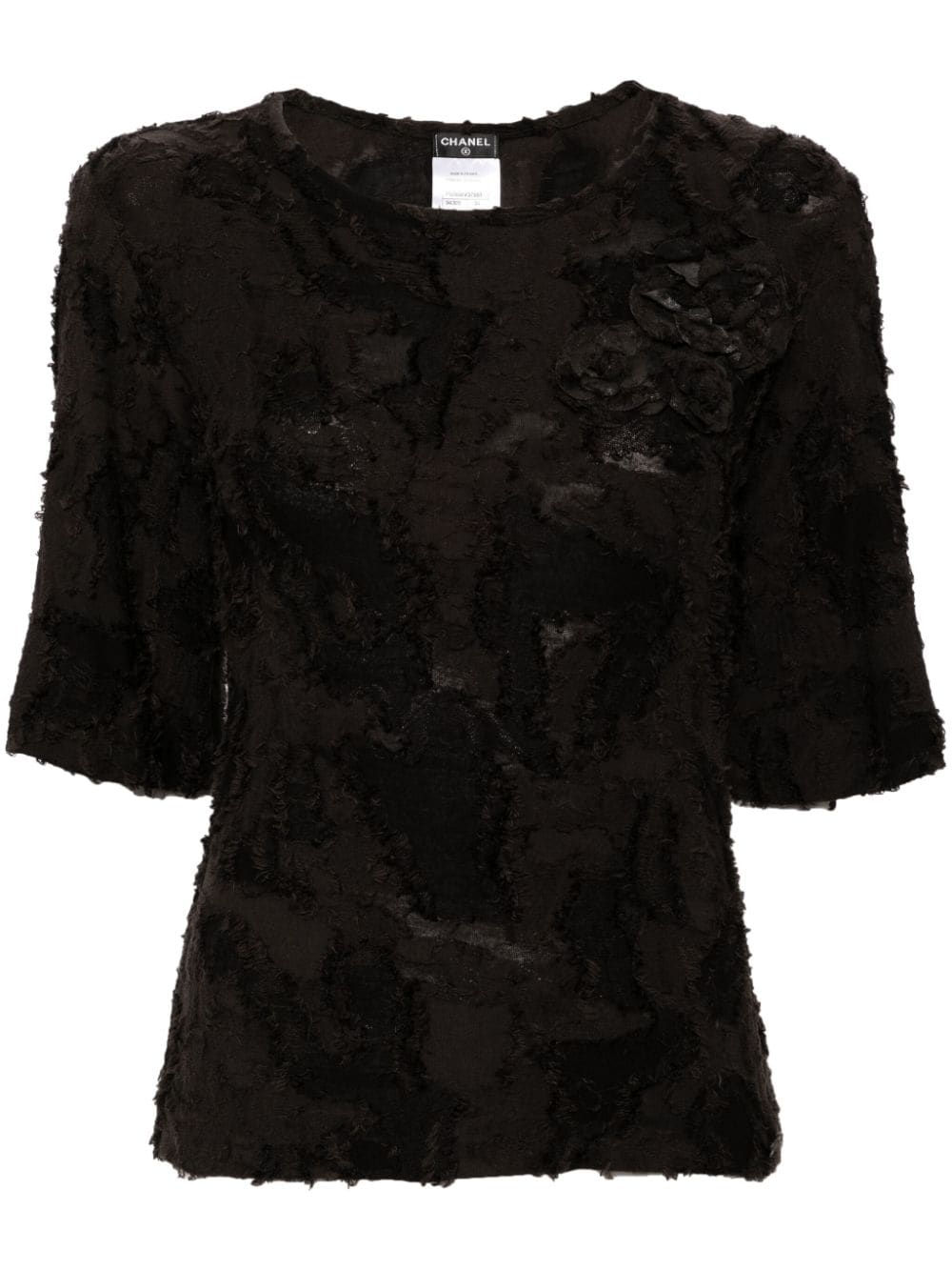 Chanel black cotton top with three brooches, front view