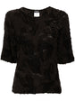 Chanel black cotton top with three brooches, front view
