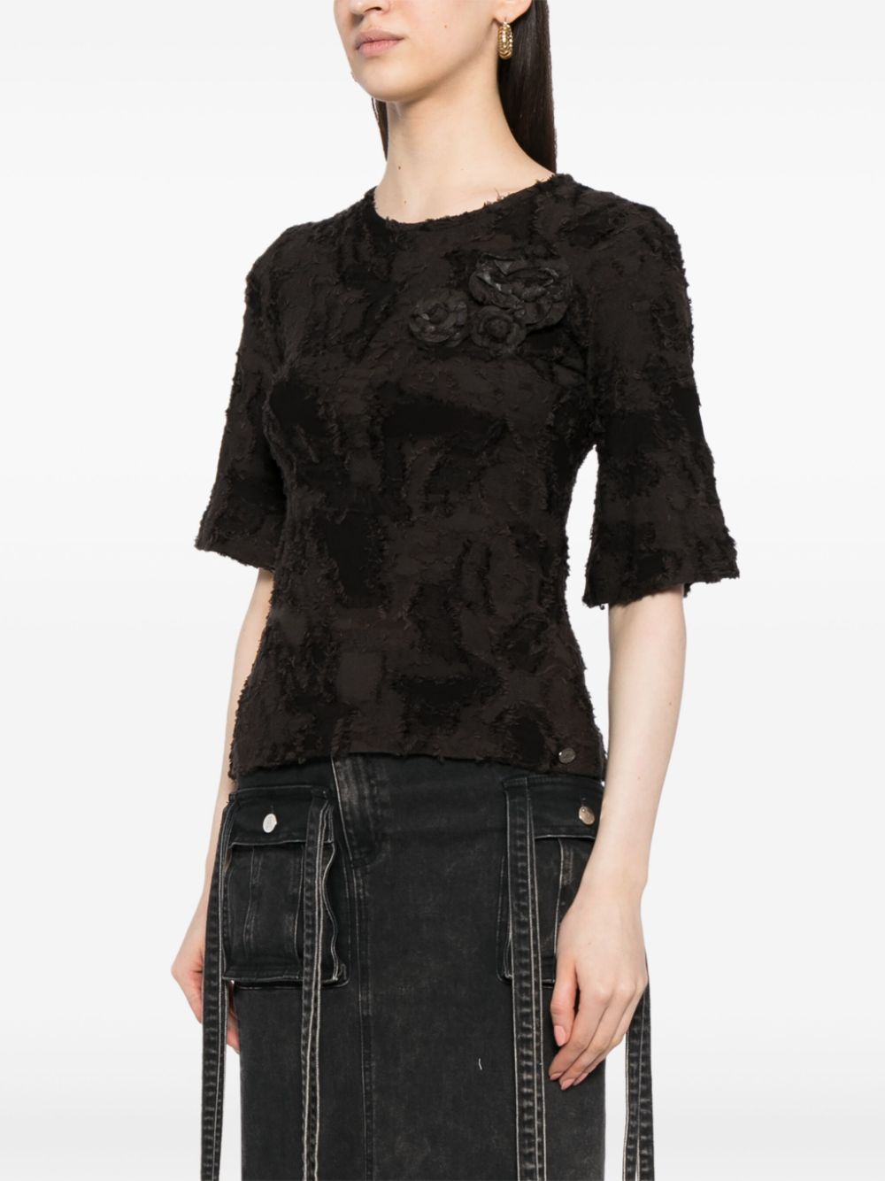 Chanel black cotton top with brooches, side view