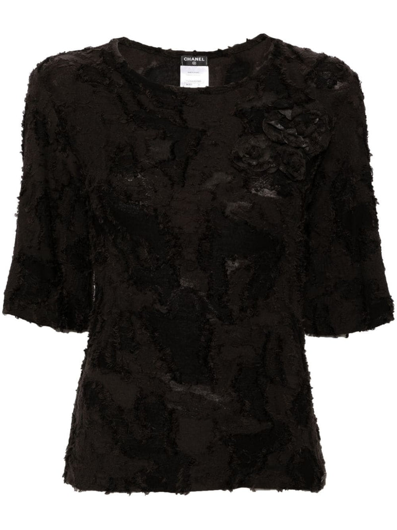 Chanel black cotton top with three brooches, front view
