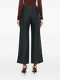 Charcoal linen wide-leg trousers by Chanel, showcasing relaxed fit and tailored design, with pleats and side pockets.