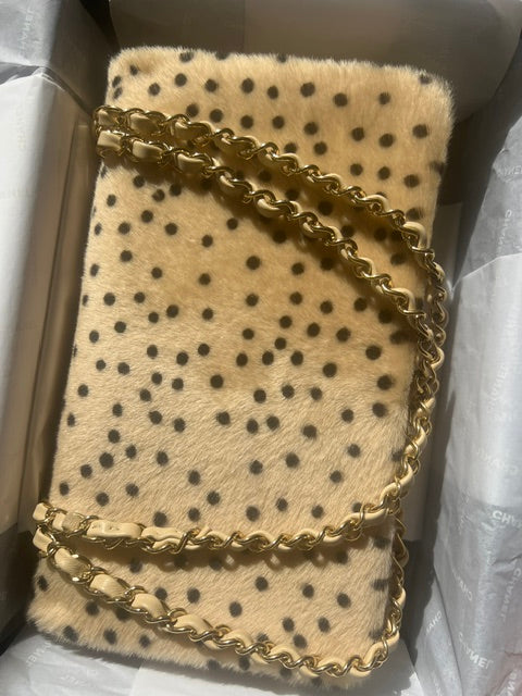 Chanel Cheetah Print Medium Flap Bag with gold hardware, shoulder bag featuring a cheetah pattern and classic design.