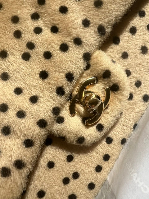 Chanel Cheetah Print Medium Flap Bag with gold hardware, stylish shoulder bag featuring animal print and elegant design.