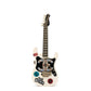 Chanel Collectible Guitar Minaudière Clutch Bag in white and black plexiglass with guitar-shaped design, CC logo detail, sticker-style motifs, pearl embellishment, gold-tone hardware, and chain shoulder strap.