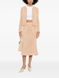 Chanel crochet knit skirt in a stylish design, featuring intricate crochet patterns and a classic, elegant silhouette.