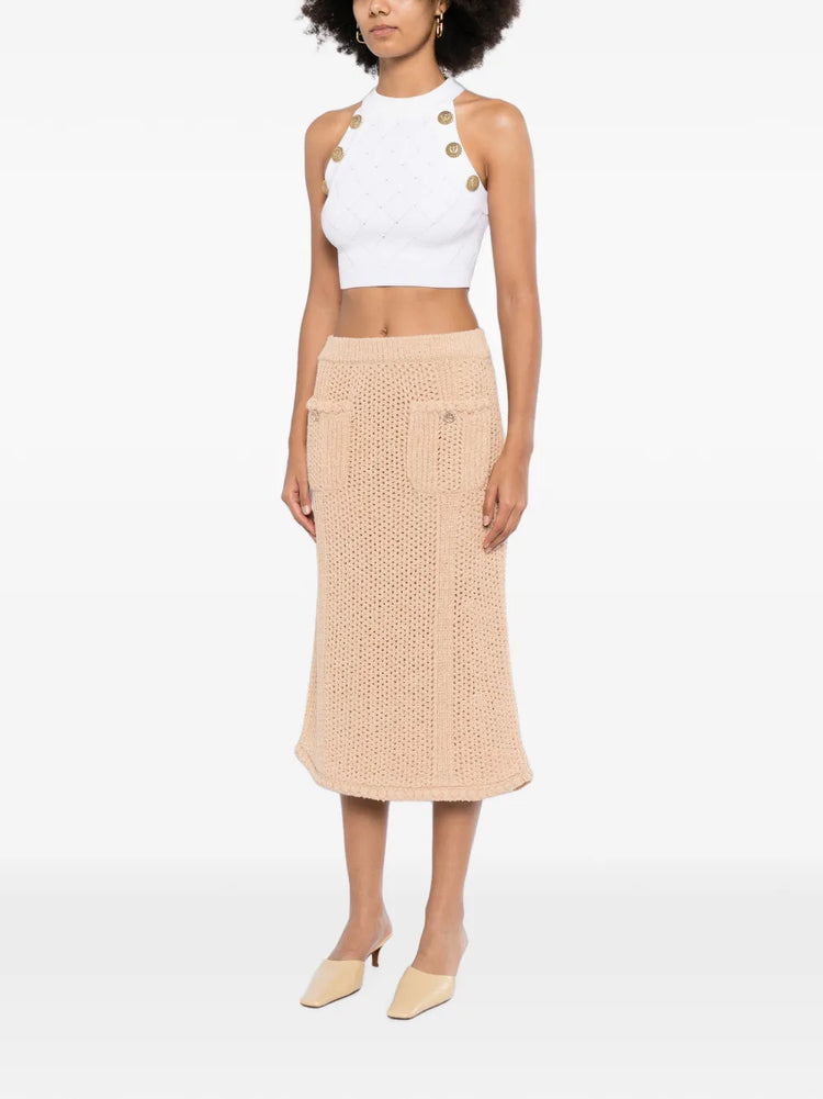 Chanel crochet knit skirt featuring a textured, intricate design in a stylish, elegant silhouette.