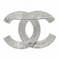 Chanel crystal pin brooch with sparkling detailing and elegant design, shown from the back with pin fastening.